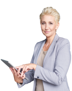 Woman with short blonde hair wearing a light blue tweed coat over a beige shirt holding a tablet on her right hand and tapping it with her left hand