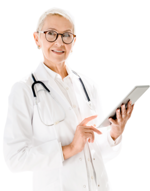 Elderly woman with short white hair wearing a white nurse's coat with a stethoscope around her neck holding a tablet with her left hand